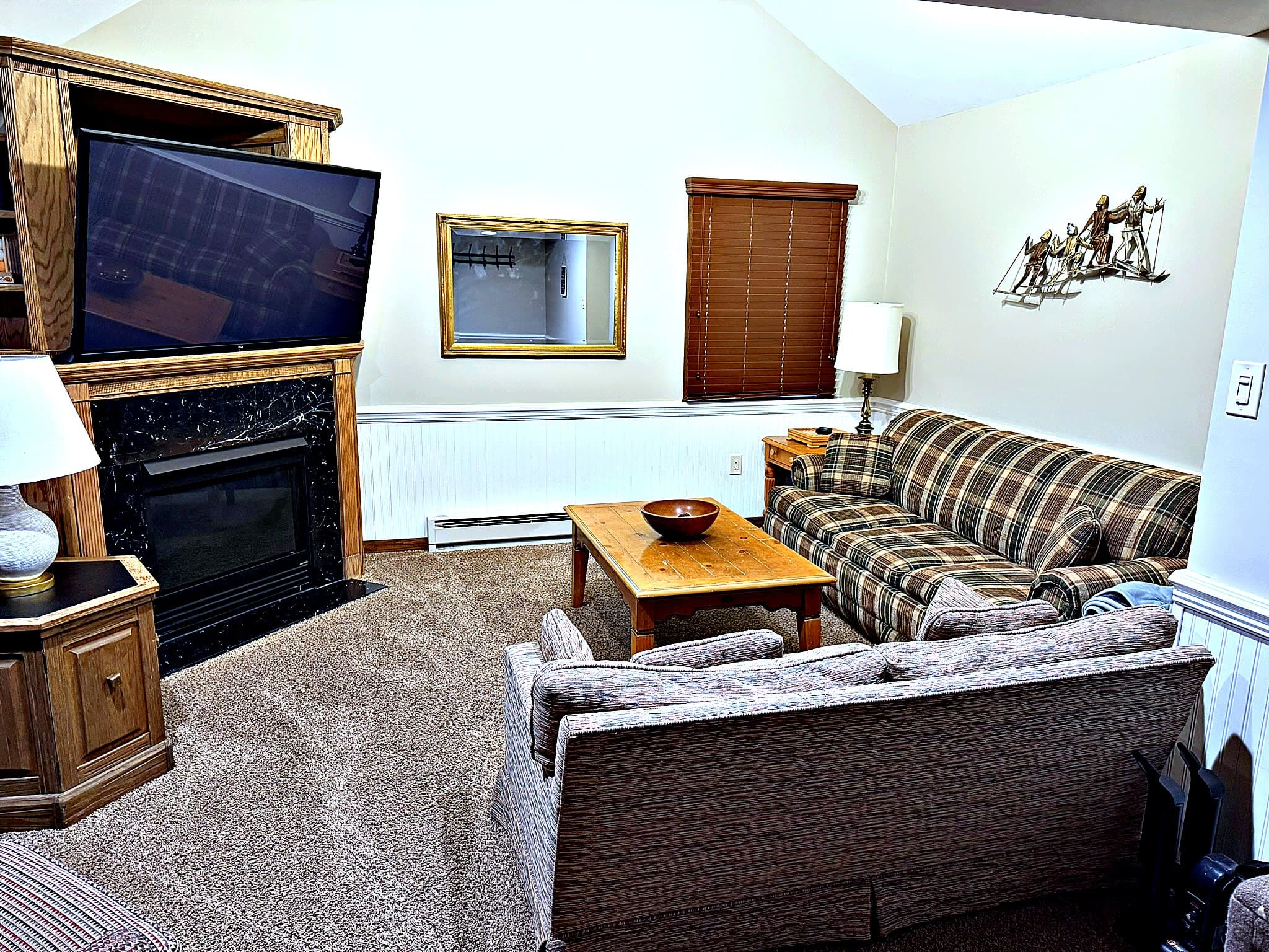 Living area with gas fireplace and big-screen TV